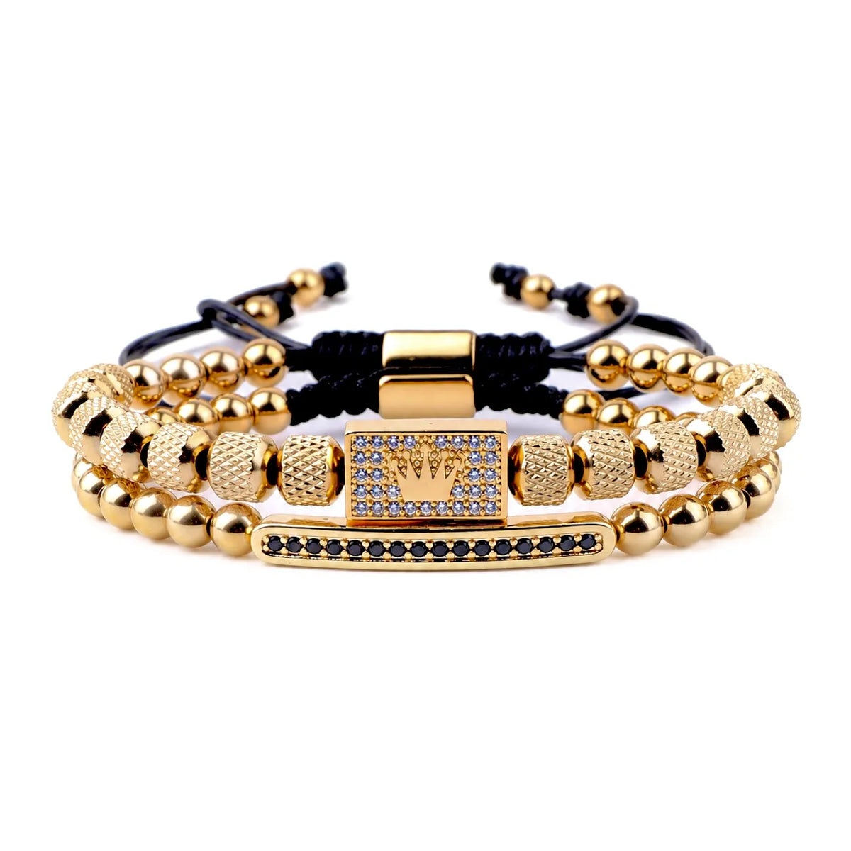 Gold beaded bracelet with a clasp on a white background